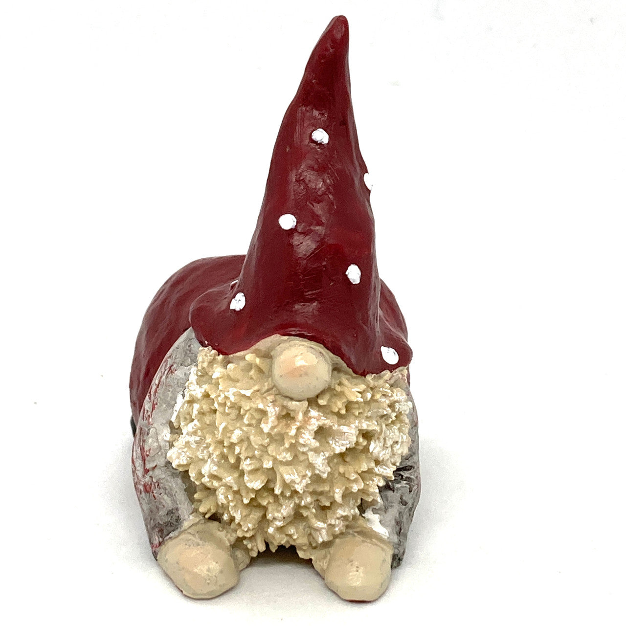 Tomten Max Laying on Stomach